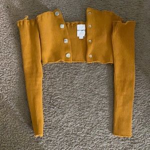 Long sleeve crop . It’s thick and pretty tight for a medium .